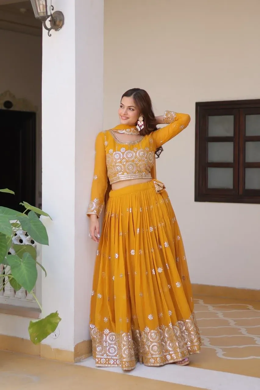 yellow embroidered georgette lehenga choli set with intricate embellishments, perfect for weddings and festive occasions.
